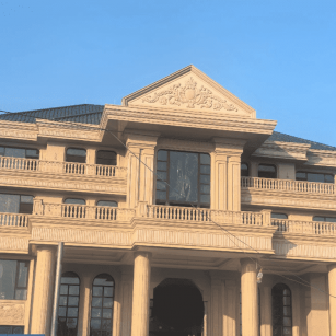 秦皇岛黄金麻别墅外墙干挂石材效果示例