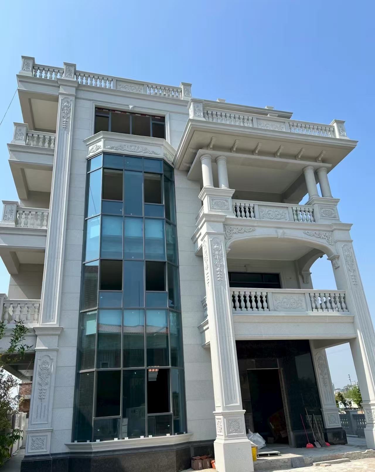 秦皇岛 白麻花岗岩别墅外墙干挂效果展示