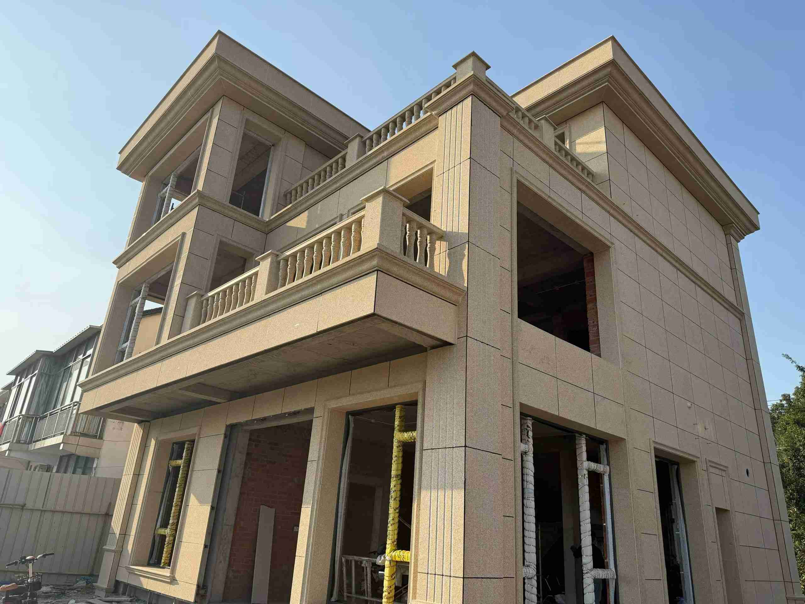 秦皇岛 黄金麻花岗岩石材荔枝面外墙干挂效果展示